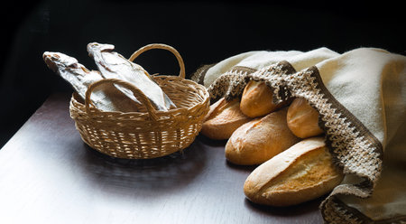 Holy raw rural box pita cake bakery Lord pray bless retro Israel sign story. Close up view white jew human man boy towel catch cathol dry sea supper still life dark black wooden table desk text spaceの写真素材