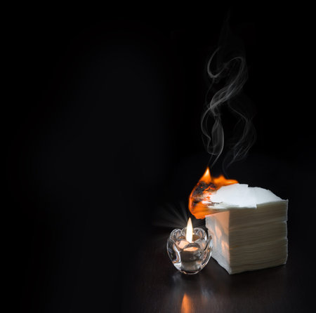 Close up view bright red retro secure estate wax lit glow tragedy black text space. Old protect property safe white dry closeup desk even night wed event decor ablaze disaster sign backdrop copyspaceの写真素材