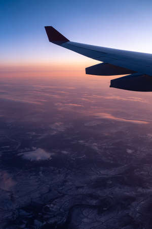 View from the plane window on the winter river and snowの写真素材