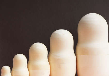 Wooden doll. Several wooden dolls. Doll made of wood.の写真素材