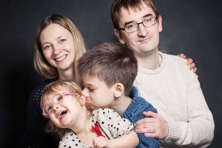 Son and Daughter on Parent Hands