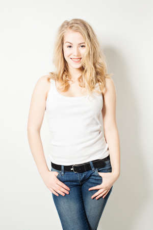 Happy woman standing on backgroundの写真素材