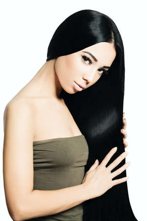 Portrait of Beautiful Sensual Woman with Elegant Hairstyle and Perfect makeup.の写真素材