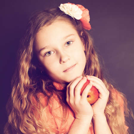 Girl holding Apple Fruit.の写真素材