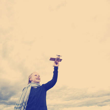 Traveling and journey concept girl and airplaneの写真素材