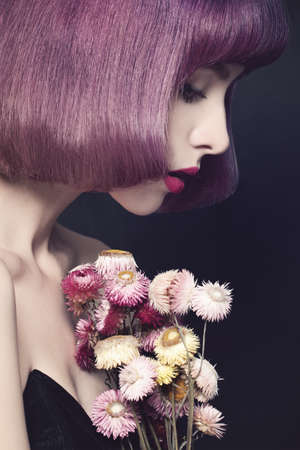 Pretty Woman with Fashion Hairstyle. Purple Coloring Hair.の写真素材