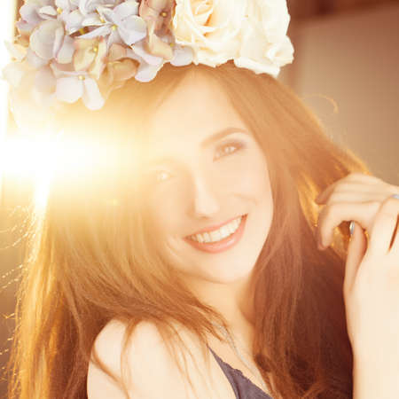 Carefree Happy Woman in Summer Sunlightの写真素材
