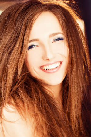 Smiling Woman with Red Hairの写真素材