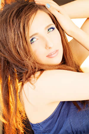 Beautiful Woman. Curly Hairstyle and Makeupの写真素材