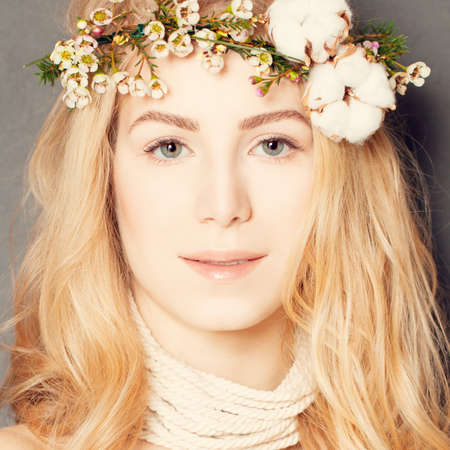 Natural make-up and Curly Hairstyle. Female Face closeupの写真素材