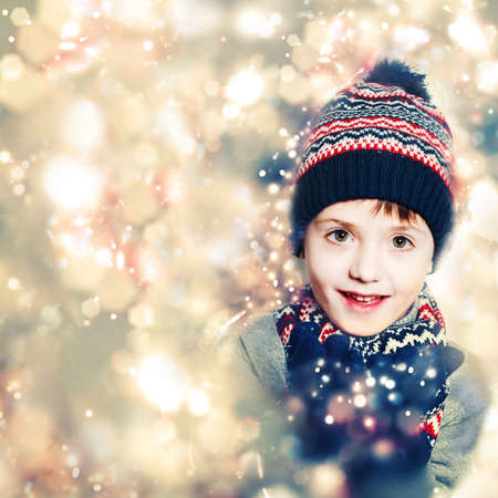 Child Boy on Christmas Glitter Sparkle Backgroundの写真素材