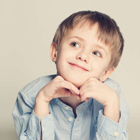 Cute child looking upの写真素材