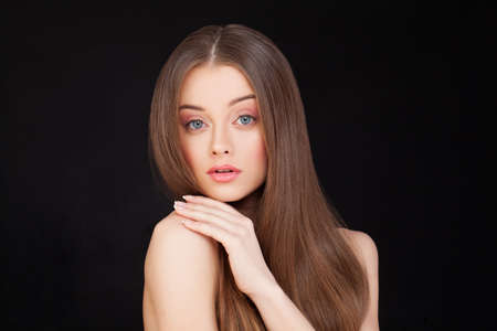 Portrait of Beautiful Model on Black Background.の写真素材