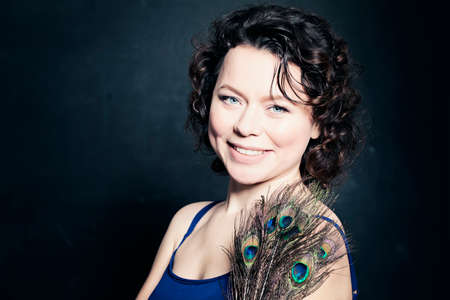 Mature Woman Fashion Model with Make-up and Curly Hairの写真素材