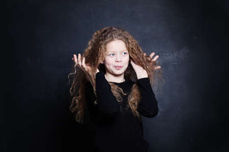 Cute Child with Long Red Hair