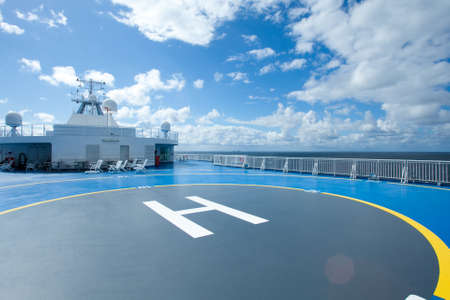 Ship, heliport and sky with cloudsの写真素材