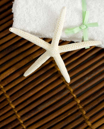 Beauty Treatment - White Star on Bamboo Backgroundの写真素材