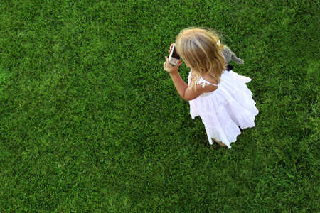 sreen grass background and girlの写真素材