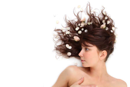 beautiful long-haired girl relaxing in spa salon. Soft focusの写真素材