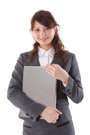 happy woman student holding a laptop isolated on whiteの写真素材