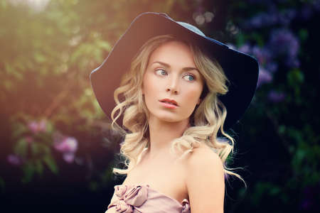 Romantic Fashion Model in Hat Outdoorsの写真素材