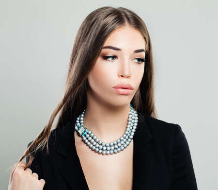 Beautiful Young Woman with Makeup and Long Brown Hairの写真素材