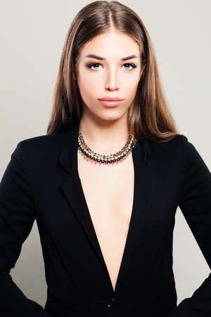 Perfect Woman in Black Suit. Beautiful Young Modelの写真素材