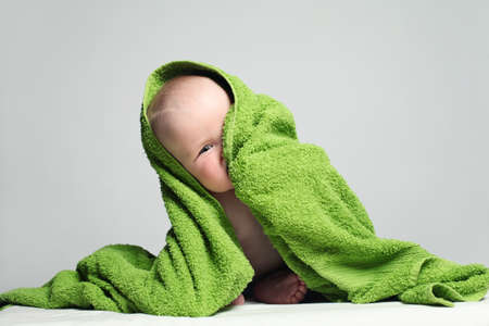 Playful Baby Laughing. Cute Child on Backgroundの写真素材