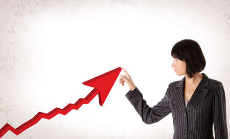 Happy Business Woman with Rising Arrow, Representing Business Growth. Business Success Conceptの写真素材