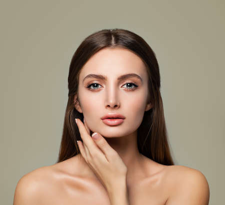 Spa Model Woman with Healthy Skin and Hair on Background. Spa Beauty, Facial Treatment and Cosmetology Conceptの写真素材