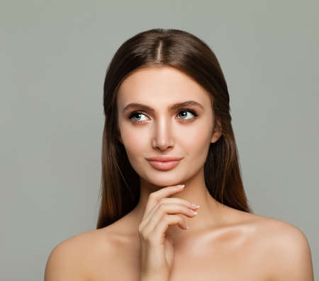 Young Healthy Woman Spa Model Looking Up, Skincare and Facial Treatment Conceptの写真素材