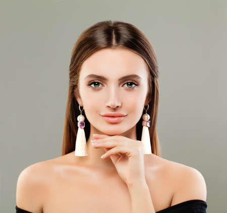 Cute Fashion Model Girl with White Silky Earringsの写真素材