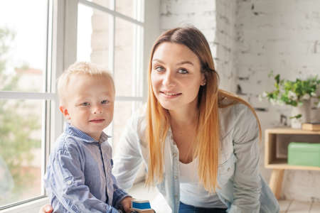 Portrait of Healthy Woman and Child Boy at Home. Happy Family