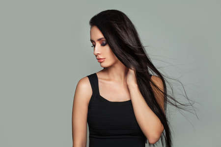 Young Model Woman with Perfect Makeup and Long Hairstyle. Young Brunette Beautyの写真素材