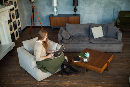 Student Woman Using Laptop at Studioの写真素材