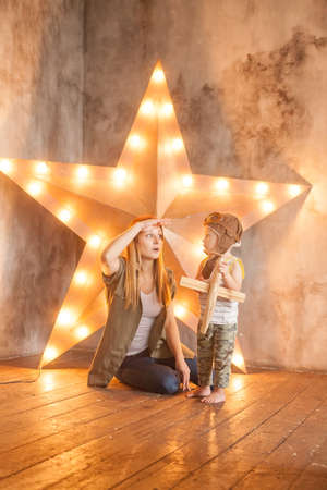 Mother and Child in Pilot Hat Playing Togetherの写真素材