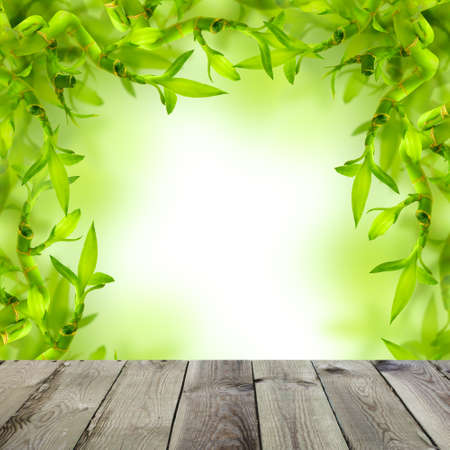 Spa Background with Green Bamboo and Empty Wooden Tableの写真素材