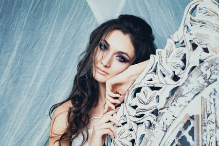 Sensual Woman on White Retro Style Background. Cute Female Model Face