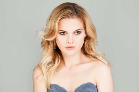 Young Woman with Blonde Hair. Pretty Girl Portraitの写真素材