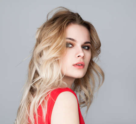 Blonde woman face. Female model with blonde hairの写真素材