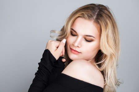 Pretty Female Model Portrait. Blonde Woman Posingの写真素材