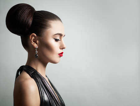Fashion Portrait of Elegant Young Woman in Black Clothesの写真素材