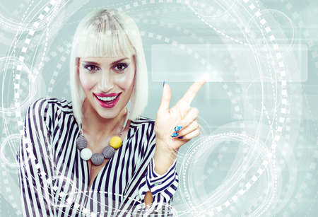 Happy business woman touching address bar on virtual displayの写真素材