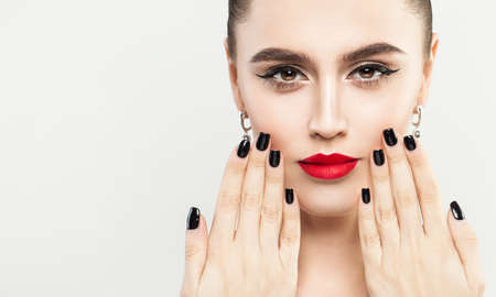 Pretty Young Woman with Hair Bun Hairstyle and Eyeliner Make up.の写真素材