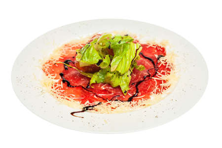 Carpaccio with parmesan on plate isolated on white background. Gourmet restaurant food の写真素材