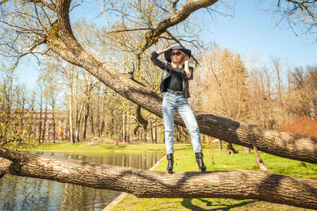 Fashion Model Woman in Blue Hat Outdoorsの写真素材