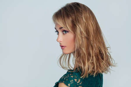 Portrait of pretty woman on background with copy spaceの写真素材