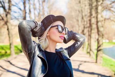 Young Carefree Woman Smiling, Outdoors Fashion Portraitの写真素材