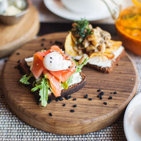 Danish traditional cuisine. Smorrebrod sandwich in restaurantの写真素材