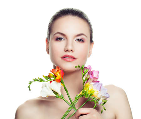 Perfect Spa Woman with Healthy Skin and Flowers Isolated on White Backgroundの写真素材